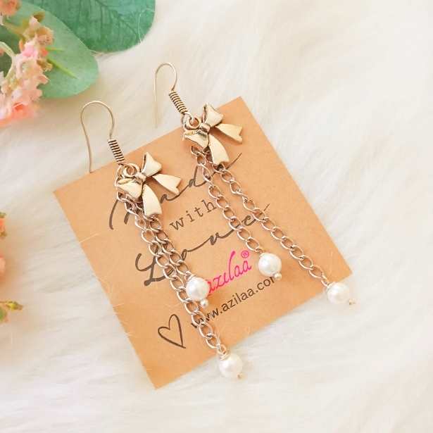 Cute bow charm pearl designer earrings at ?1550 Azilaa