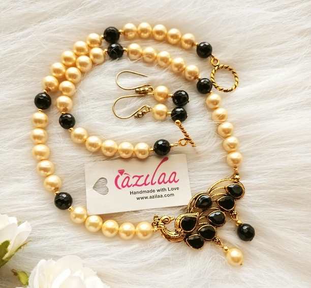 Peacock on sale pearl pendant