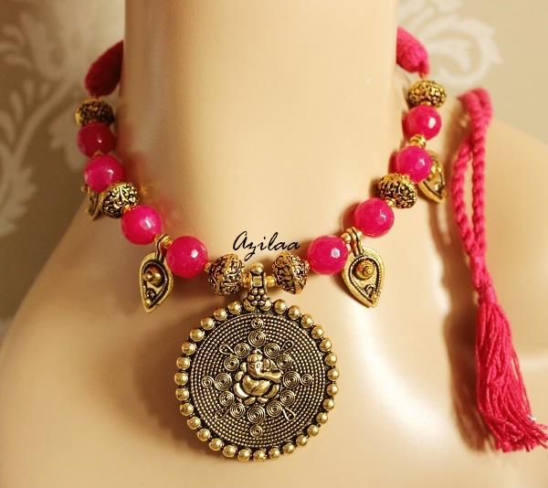 Dark pink ethnic Ganesha antique gold tone necklace set