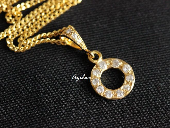 Eternity circle round golden pendant