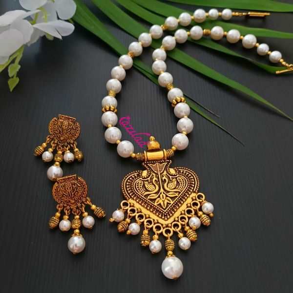 Ethnic Pearl designer golden necklace earrings set