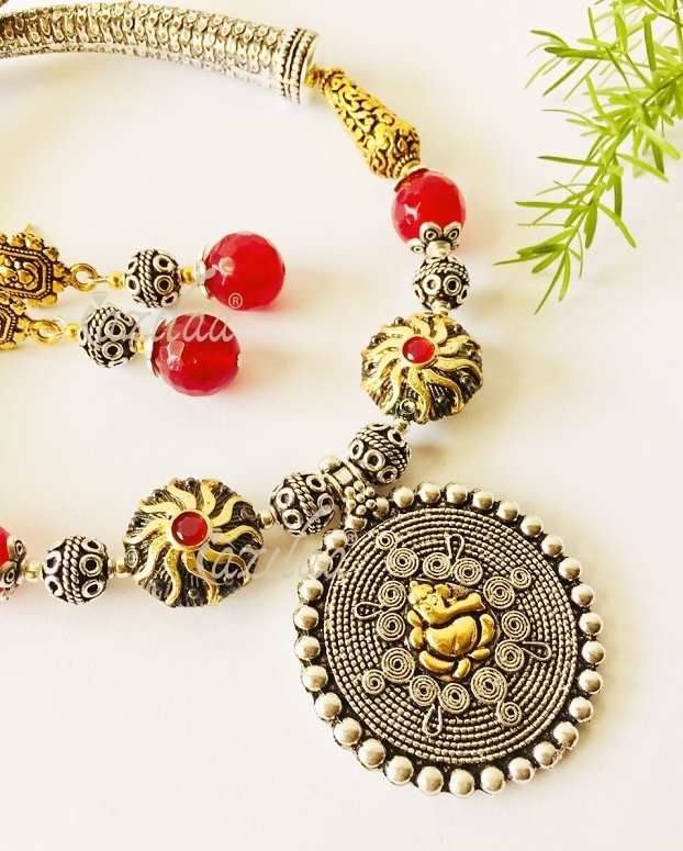 Ethnic ganesha pendant gemstone beaded dual tone necklace set at ?2950