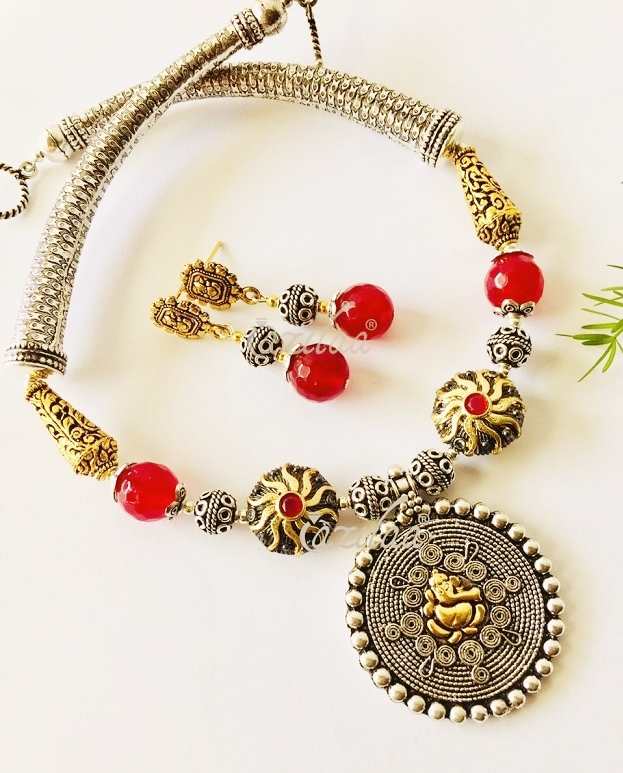 Ethnic ganesha pendant gemstone beaded dual tone necklace set at ?2950