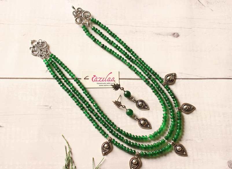 Ethnic green triple layered beaded necklace earrings set