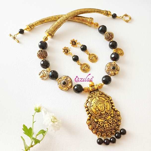 Goddess Durga golden gemstone black necklace set