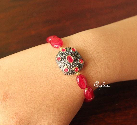 Gold plated maroon gemstone handmade bracelet