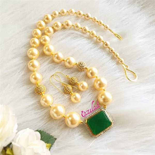 Gorgeous golden graduated pearl necklace set at ₹3550 | Azilaa
