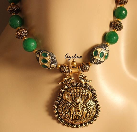 Krishna pendant necklace set with green stone beads