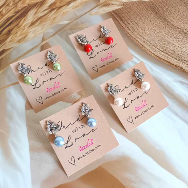 Green pearl stud dangler earrings