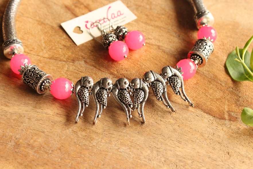 Hot pink parrot statement oxidized silver tone bird necklace set