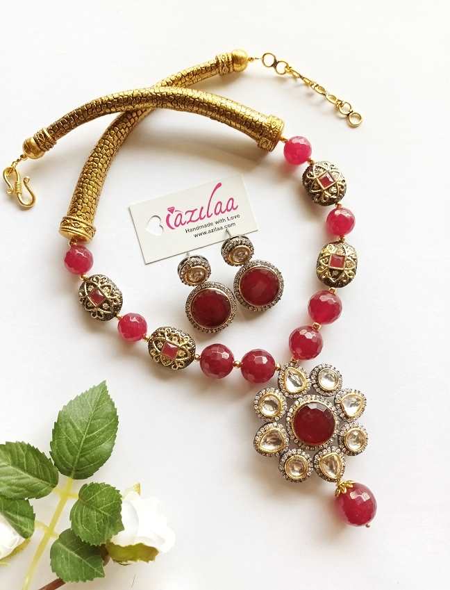 Maroon flower antique golden gemstone necklace set at ₹5450 | Azilaa