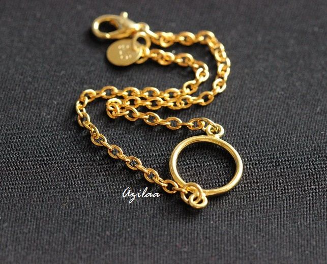 Modern designer golden handmade circle bracelet