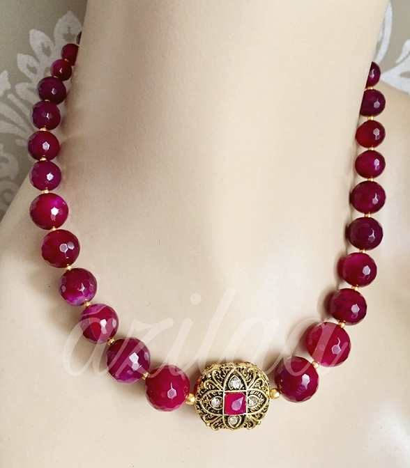 Pinkish maroon gemstone handmade golden necklace set