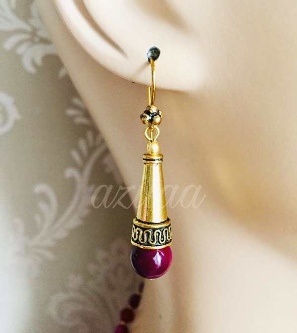 Pinkish maroon gemstone handmade golden necklace set