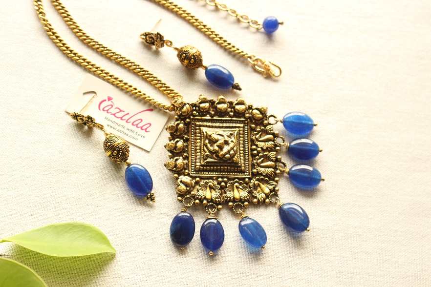 Blue antique golden goddess pendant necklace earrings set