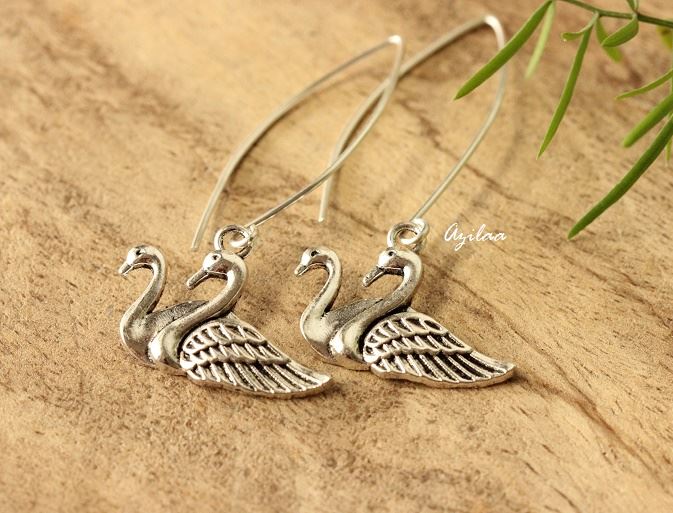 Swan charm silver dangler long earrings